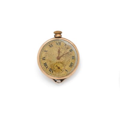 two clocks that are sitting on a white surface