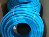 two blue hoses in a cardboard box on a table