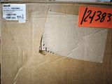 a cardboard box with a piece of paper on it