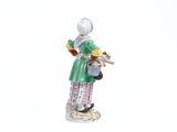 a figurine of a woman holding a watering can