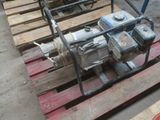 a picture of a pump on a pallet in a warehouse
