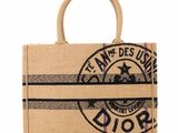 a close up of a jute bag with a logo on it
