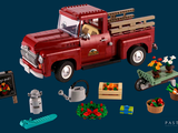a red truck that is sitting in the middle of a bunch of legos