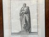 une vieille photo représentant une statue d'un homme tenant une canne