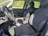 the interior of a car with black leather seats and black trims