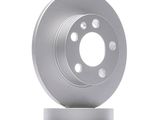 the front of a silver brake disc on a white background