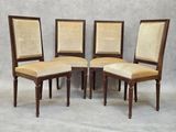 lot de quatre chaises de salle à manger de style français avec assises rembourrées