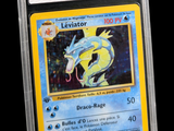 a close up of a pokemon card in a plastic case