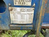 a close up of a sign on the back of a tractor