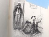 un vieux livre avec le dessin d'un homme et d'une femme