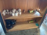 a wooden shelf with a bunch of coffee mugs on it