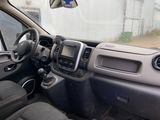 a dashboard of a car with a steering wheel and dashboard controls