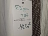 a label on a tie that says filippe