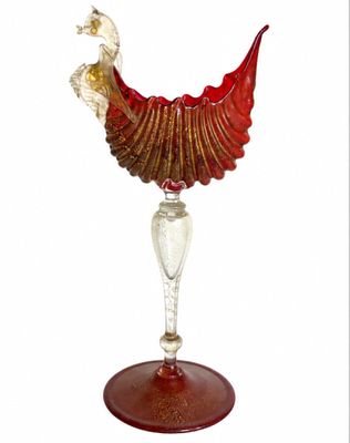 glass figurine of a rooster on a stand with a red base