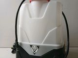 a picture of a white and black plastic container with a red handle