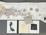 a picture of an open book with drawings on it