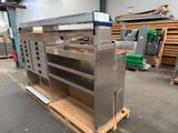 a metal shelf that is on a pallet in a warehouse