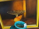 a picture of a bird sitting on a table next to a vase