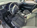 a car with a steering wheel and a dash board