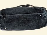 an image of a black bag on a white background