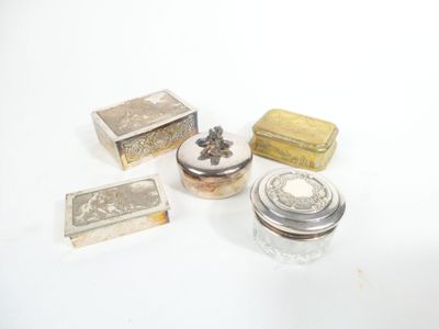 several different types of silver and silverware on a white surface
