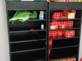 many boxes and boxes on the shelves in the room