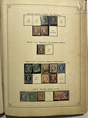 an open book with a bunch of stamps on it sitting on top of a table