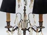 a lamp that is on a table with a lamp shade on it