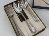 a box with a set of spoons and spoons in it