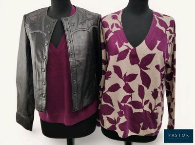 pair of women ' s leather jackets on mannequins against a white background