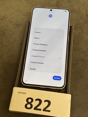 an iphone with the number 822 on it is sitting in a box