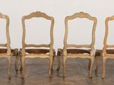 six chairs that are lined up in a row