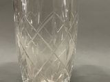 a clear glass vase with a diamond pattern on it