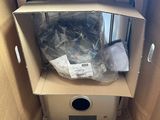 a cardboard box that has a bunch of items inside of it