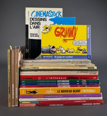 many books stacked on top of each other on a table