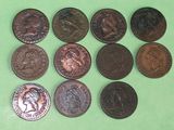 a lot of coins that are on a green surface