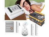 a picture of a woman laying in bed with a remote control