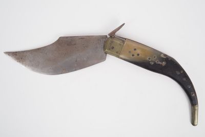 a knife that is laying on top of a table