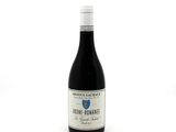 a bottle of wine that is sitting on a table