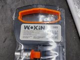 a plastic case with a wrenet in it on the floor