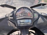 a motorcycle with a speedometer on the front of it