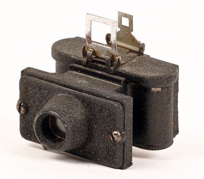 A Cornet 'Midget' brown Bakelite miniature camera in a mottled brown