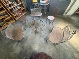 several chairs and tables are arranged in a circle in a room