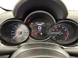 a close up of a motorcycle dashboard with various gauges