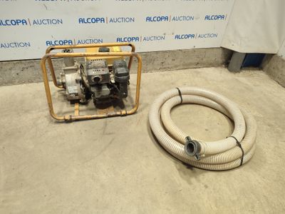 an image of a hose and a water pump in a room