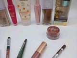 many different types of cosmetics and makeup products on the table
