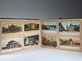 an open book with pictures of different cities on it