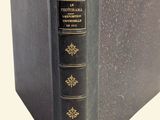 a black book that is sitting on a table
