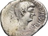 une pièce d'argent portant une tête d'homme