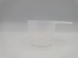 a close up of a measuring cup with a spoon in it